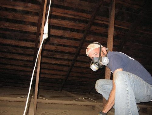 Contractor framing out a room during a renovation